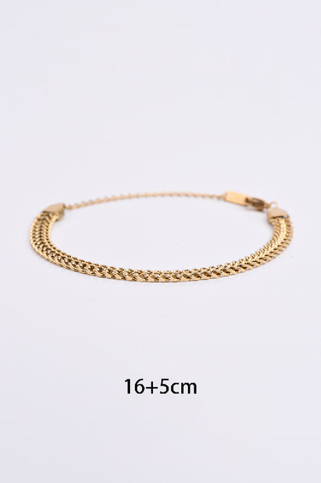 Bracelet acier inoxydable plaqué or ajustable tressé