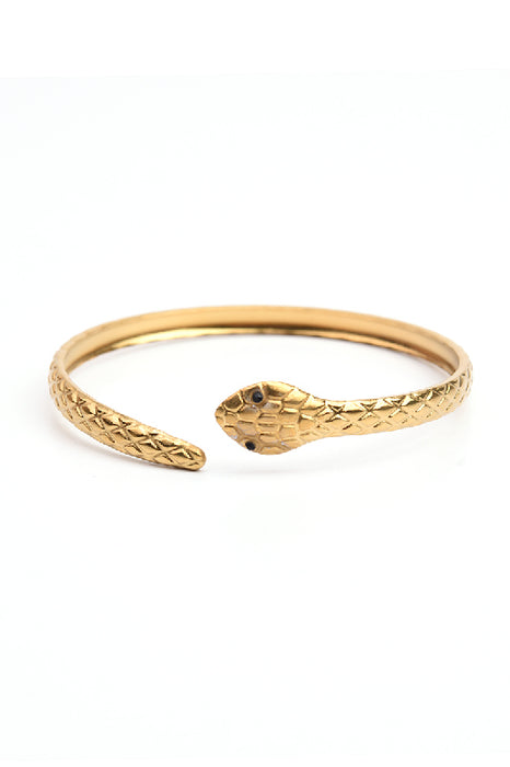 Bracelet jonc ajustable en acier inoxydable plaqué or serpent nervuré œil noir