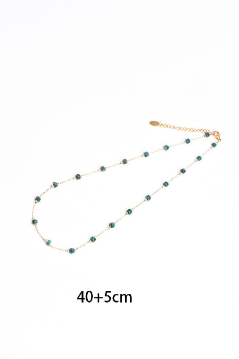 Chaîne acier inoxydable doré 40+5cm Rondelles turquoise africaine