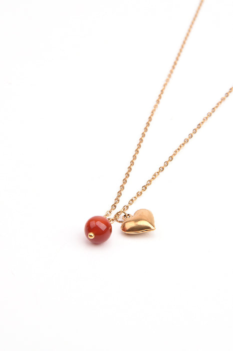 Kette Edelstahl vergoldet 45+5cm Karneolperle mit Herzanhänger