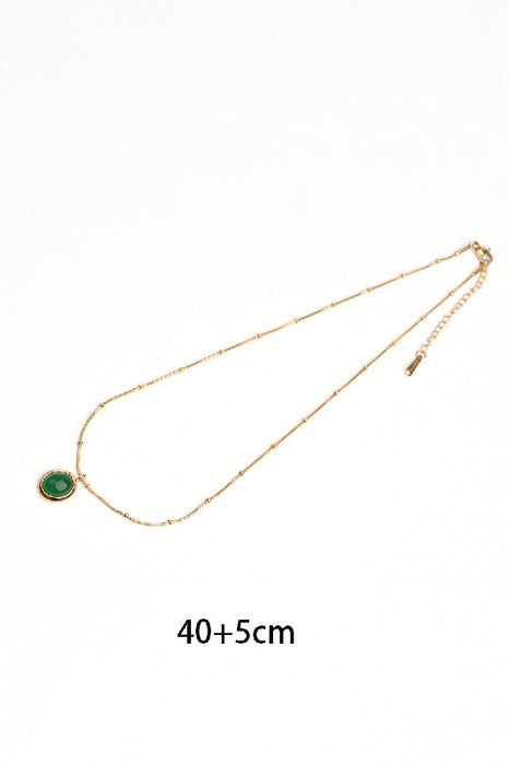 Kette Edelstahl vergoldet 40+5cm facettiertes Katzenauge grün