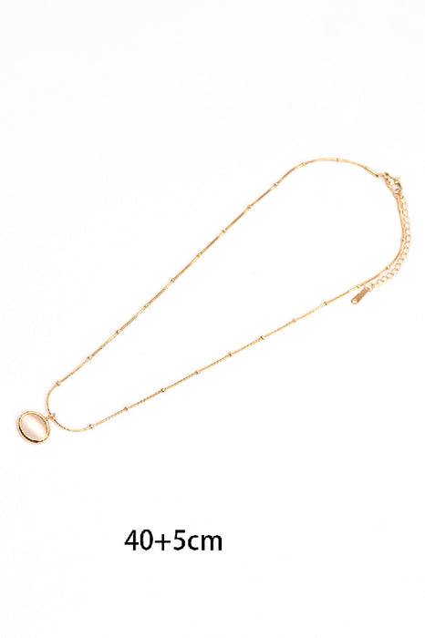 Kette Edelstahl vergoldet 40+5cm Katzenauge weiss