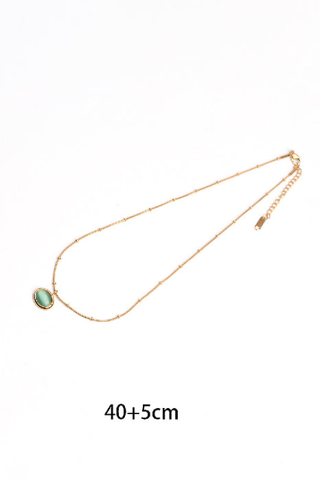 Kette Edelstahl vergoldet 40+5cm Katzenauge türkis