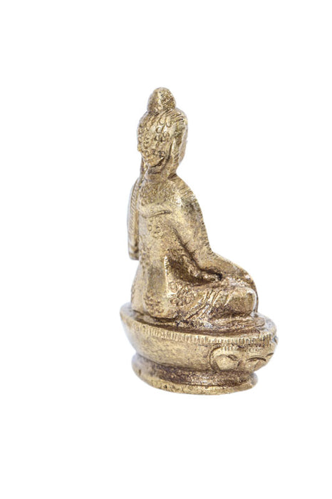 Brass figure of Buddha praying