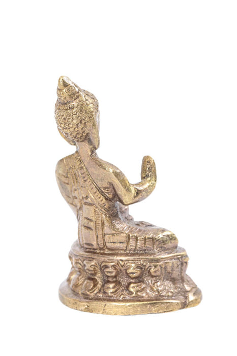 Brass figure of Buddha praying