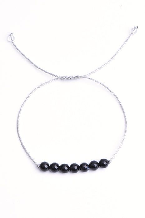 Armband 6mm schwarzer Onyx, 4mm Kristallquarz, 18 cm