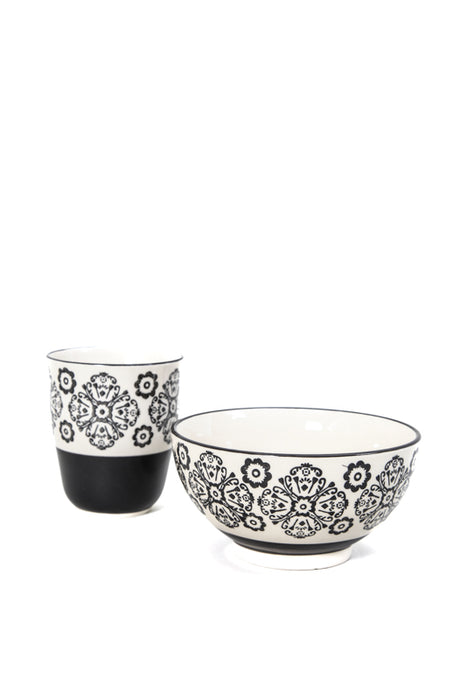 Tasse à thé beige/noir à motifs