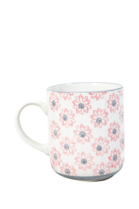 Tasse à thé de fleurs roses