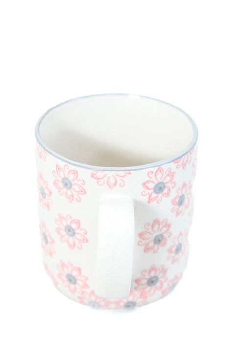 Tasse à thé de fleurs roses