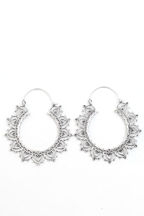 Boucles d'oreilles rondes décorées en argent