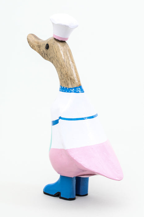 Wooden duck with chef's hat colorfully painted