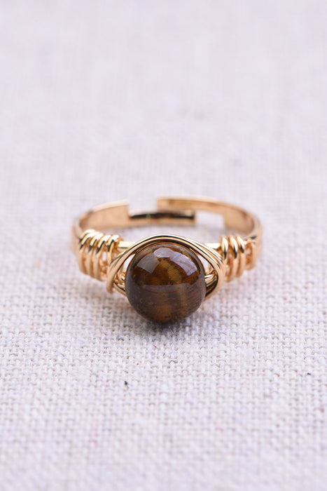 Ring tiger eye gold colored