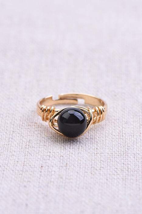 Ring black obsidian gold colored