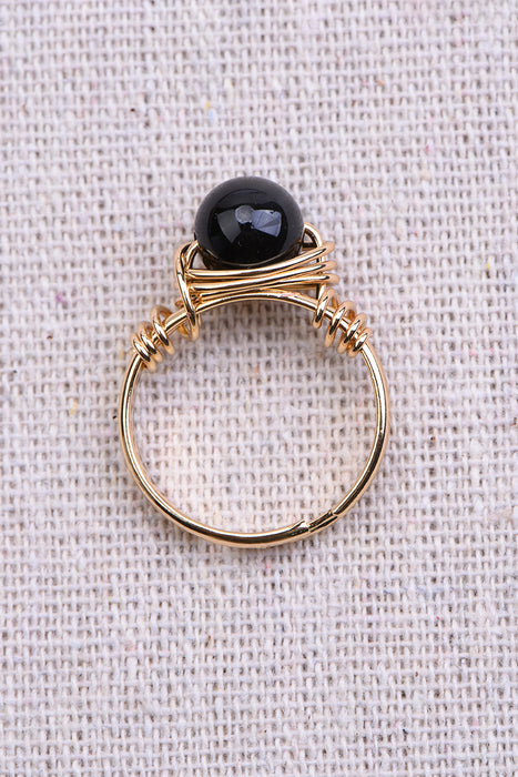 Ring black obsidian gold colored