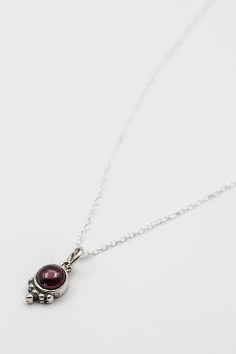 Silver necklace with garnet pendant