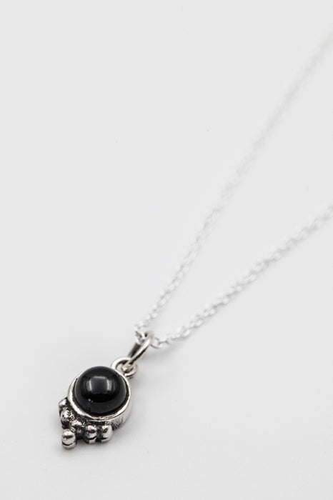 Silver necklace with black onyx pendant