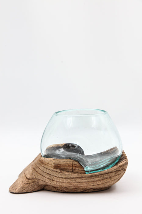 decorative glass on wooden hand