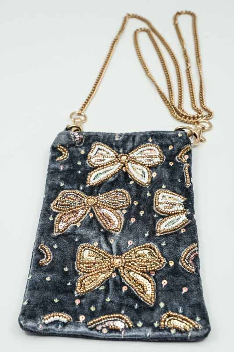 Sac à bandoulière avec nœuds cadeaux pétrole/beige/multicolore 11 x 18,75 cm