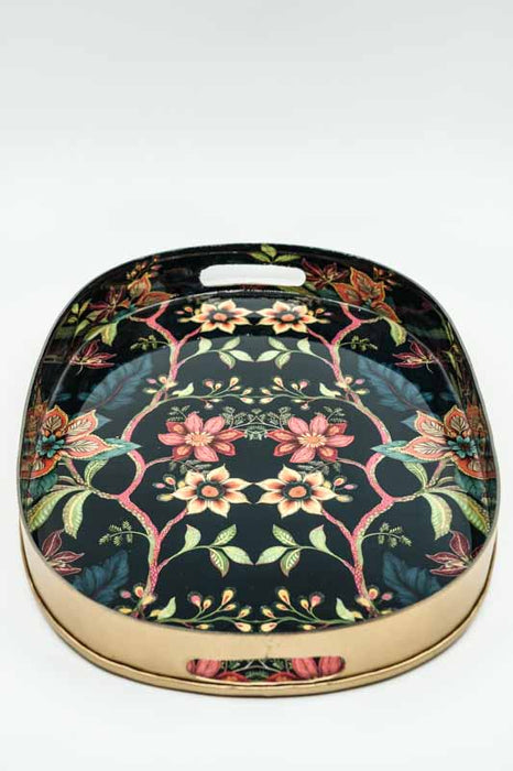 Enamelled oval serving tray with floral vines, 39x27 cm