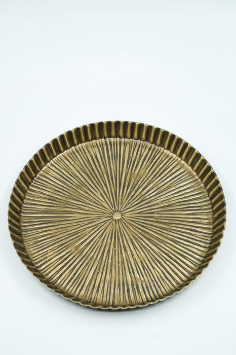 Round aluminum serving tray with a radiating pattern in brass look, medium size 25.5x2.5cm