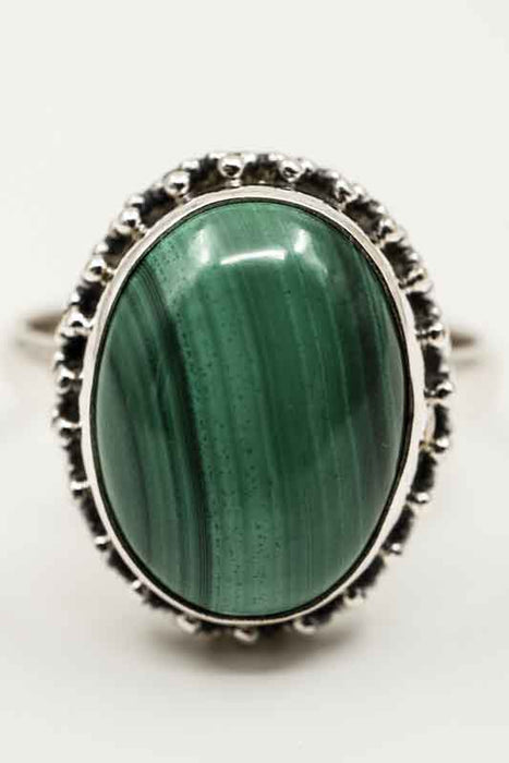 Silver ring with oval malachite decoration