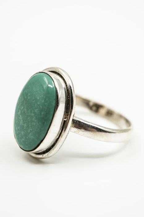 Silver ring, turquoise oval smooth setting
