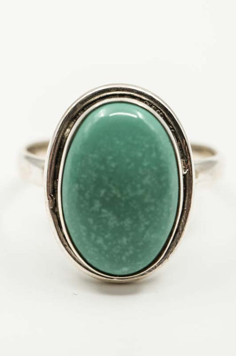 Silver ring, turquoise oval smooth setting