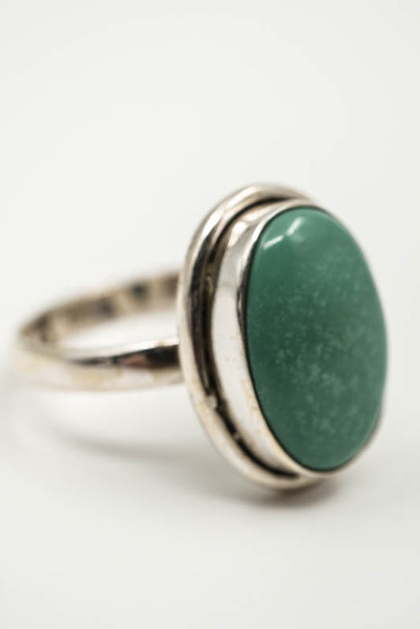 Silver ring, turquoise oval smooth setting