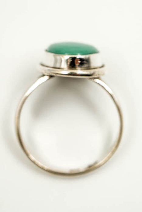 Silver ring, turquoise oval smooth setting