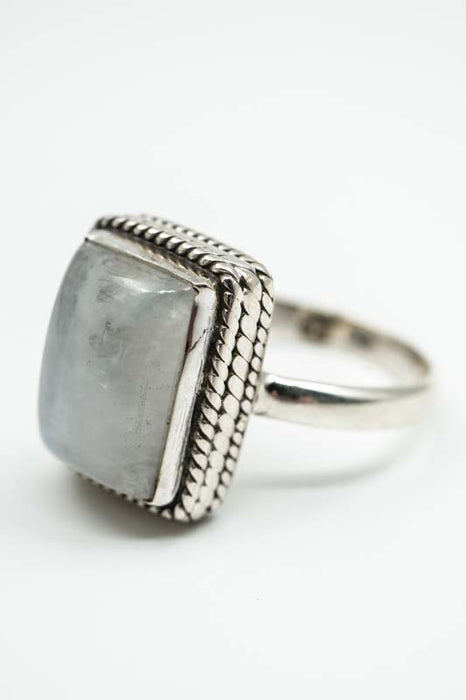 Silver ring rainbow moonstone rectangular ornate setting