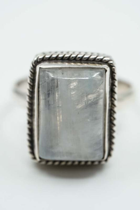 Silver ring rainbow moonstone rectangular ornate setting