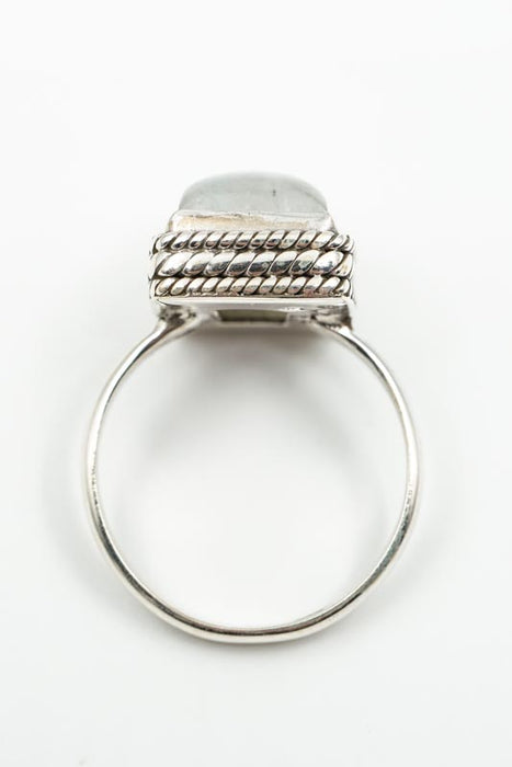 Silver ring rainbow moonstone rectangular ornate setting