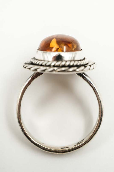 Silver ring Amber oval decorated setting