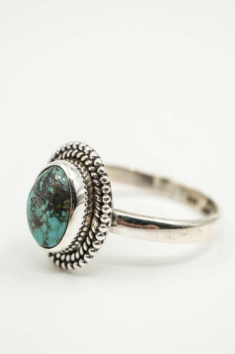 Silver ring, turquoise playful setting
