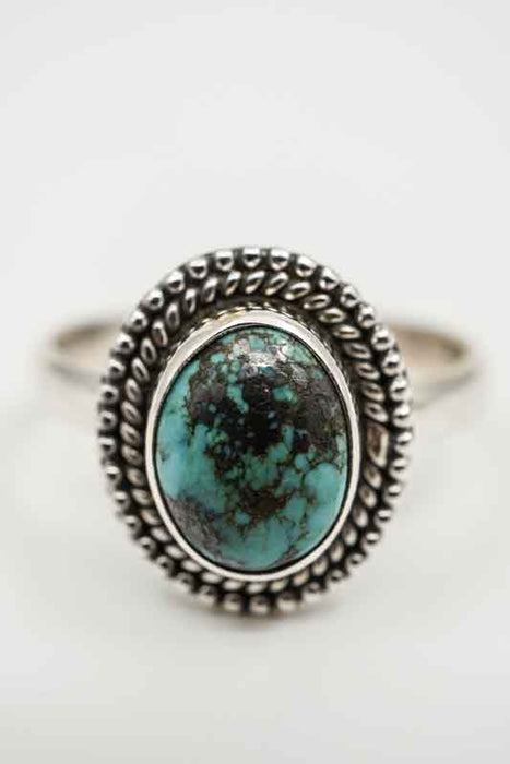 Silver ring, turquoise playful setting