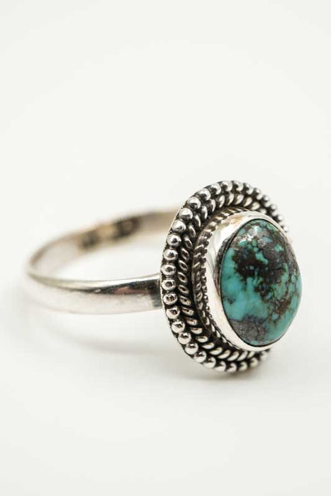 Silver ring, turquoise playful setting