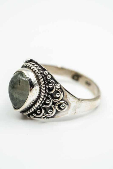 Silver ring with pyrite, teardrop-shaped playful setting