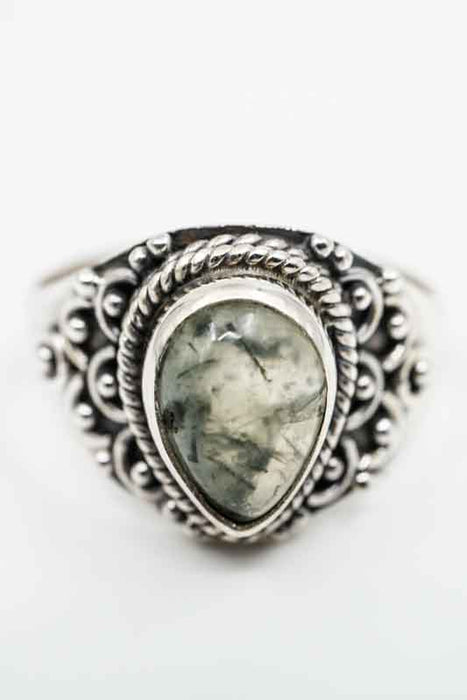 Silver ring with pyrite, teardrop-shaped playful setting