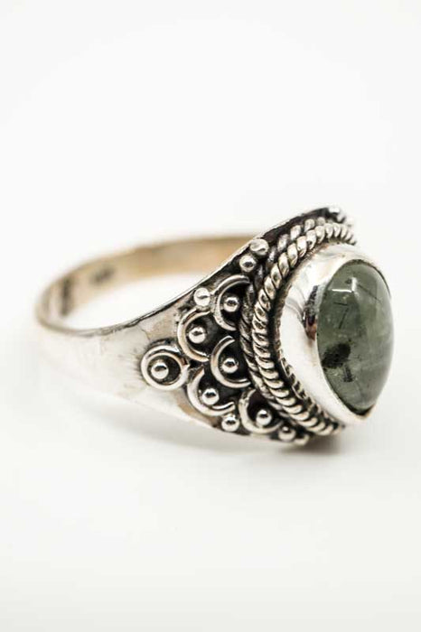 Silver ring with pyrite, teardrop-shaped playful setting