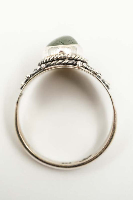 Silver ring with pyrite, teardrop-shaped playful setting