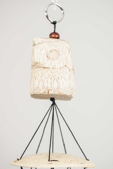 Wind chime with metal rods and owl