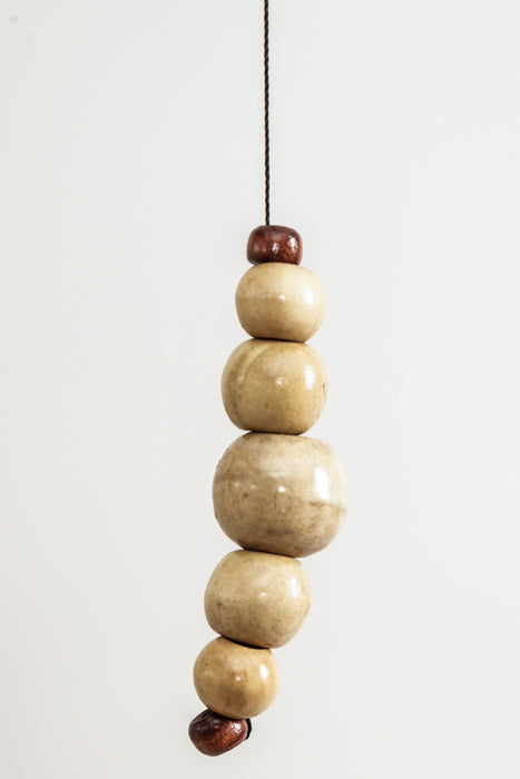 Wind chime with metal rods and owl