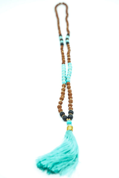 Collier rudraksha/turquoise/pierre de lave avec pompon turquoise