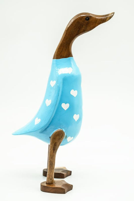 Wooden duck painted light blue with white hearts, 35cm