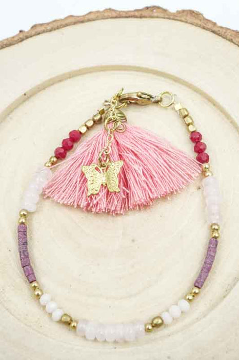 Bracelet perles de verre avec pompon abricot