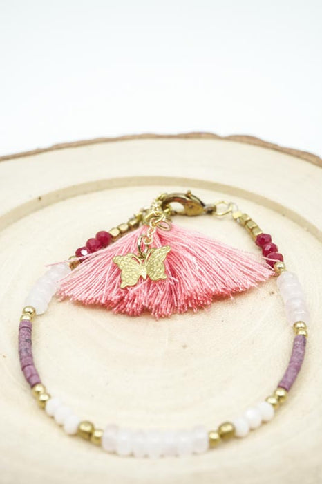 Bracelet perles de verre avec pompon abricot