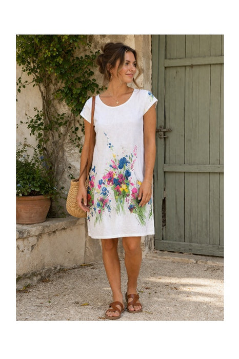 Short-sleeved white linen dress with multicoloured floral pattern