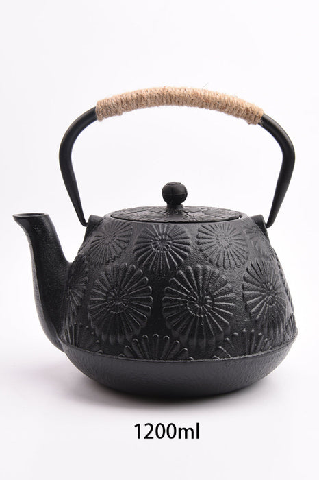 Théière en fonte noire avec motif floral monochrome, anse tressée avec cordon 1200ml 17.5x20.5cm