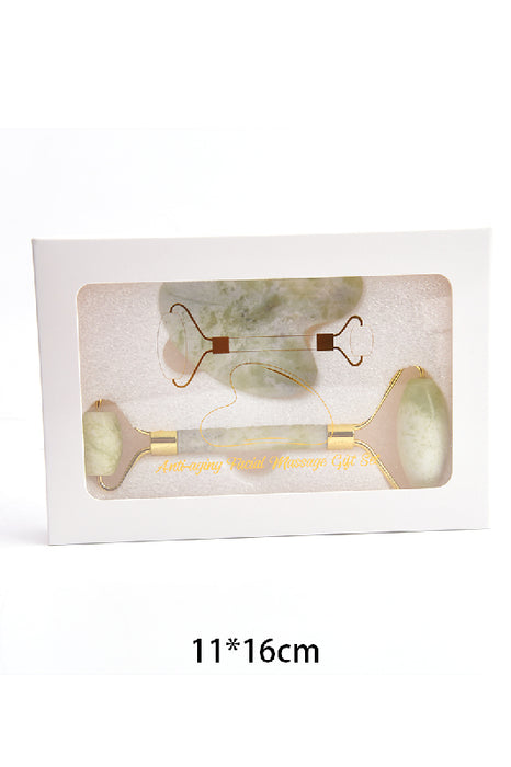 Face roller with heart-shaped light green jade Gua Sha stone