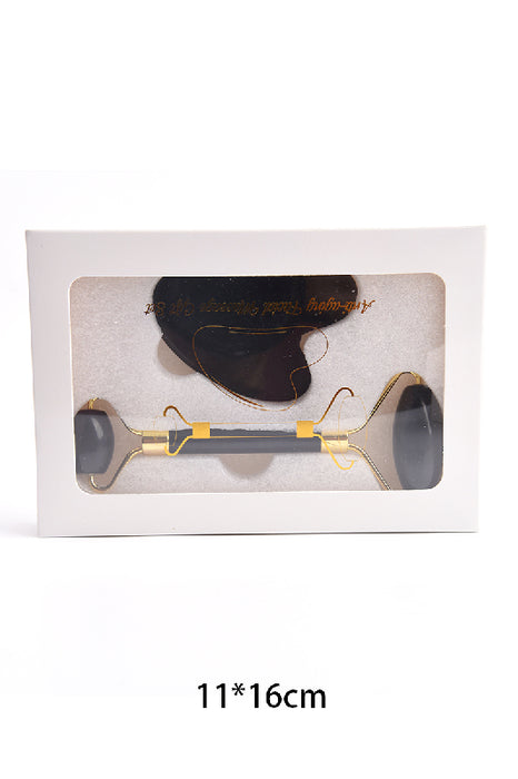 Facial roller with heart-shaped black obsidian Gua Sha stone